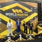 Alliance Jiu-Jitsu competitor on the top step of the IBJJF World Master 2024 podium