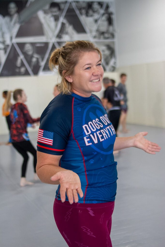 Kailee Crossey smiles while teaching a women’s self-defense seminar